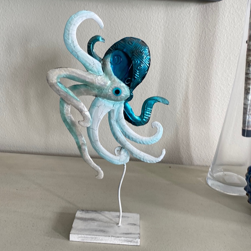 Blue and white octopus on wood base. Pretty sea decor. 7 in W x  14 in Tall